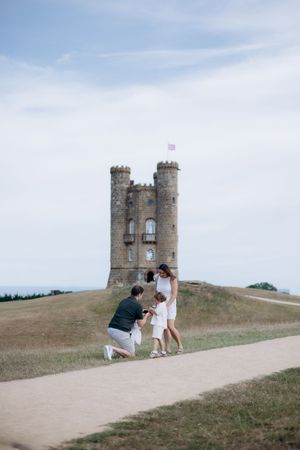 Couple celebrating their engagement in the Cotswolds.