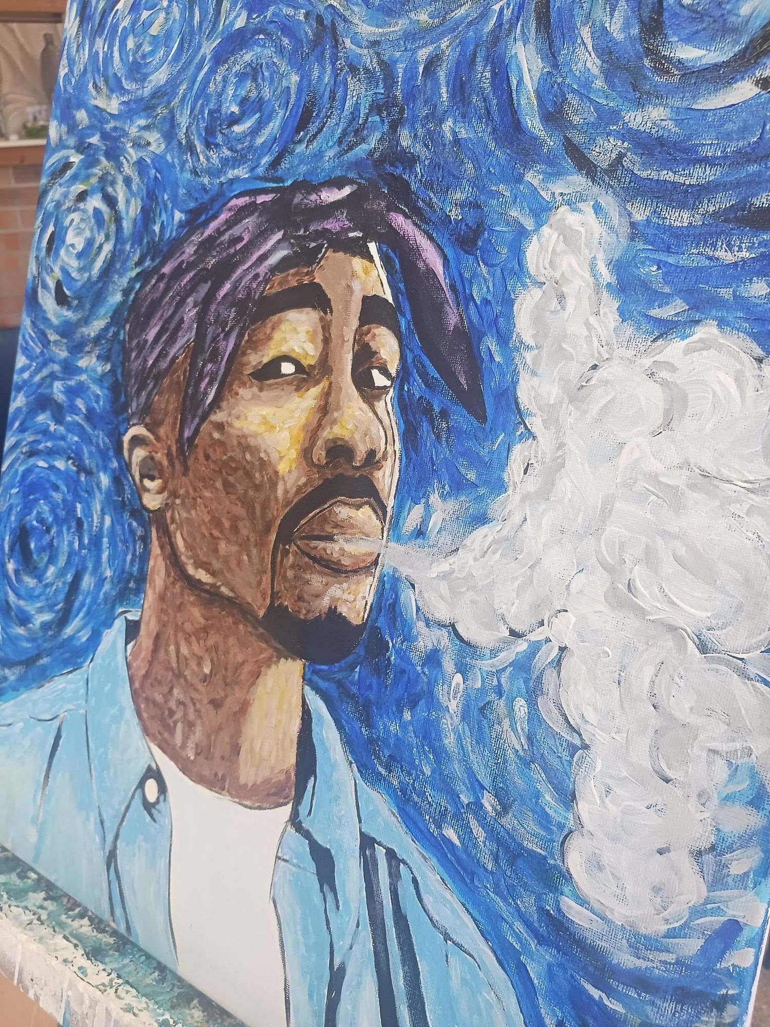 Van Gogh-inspired painting of a figure against swirling blue starry sky background.