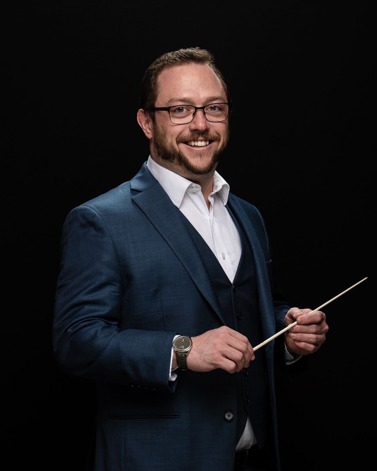 Portrait of a male band conductor.