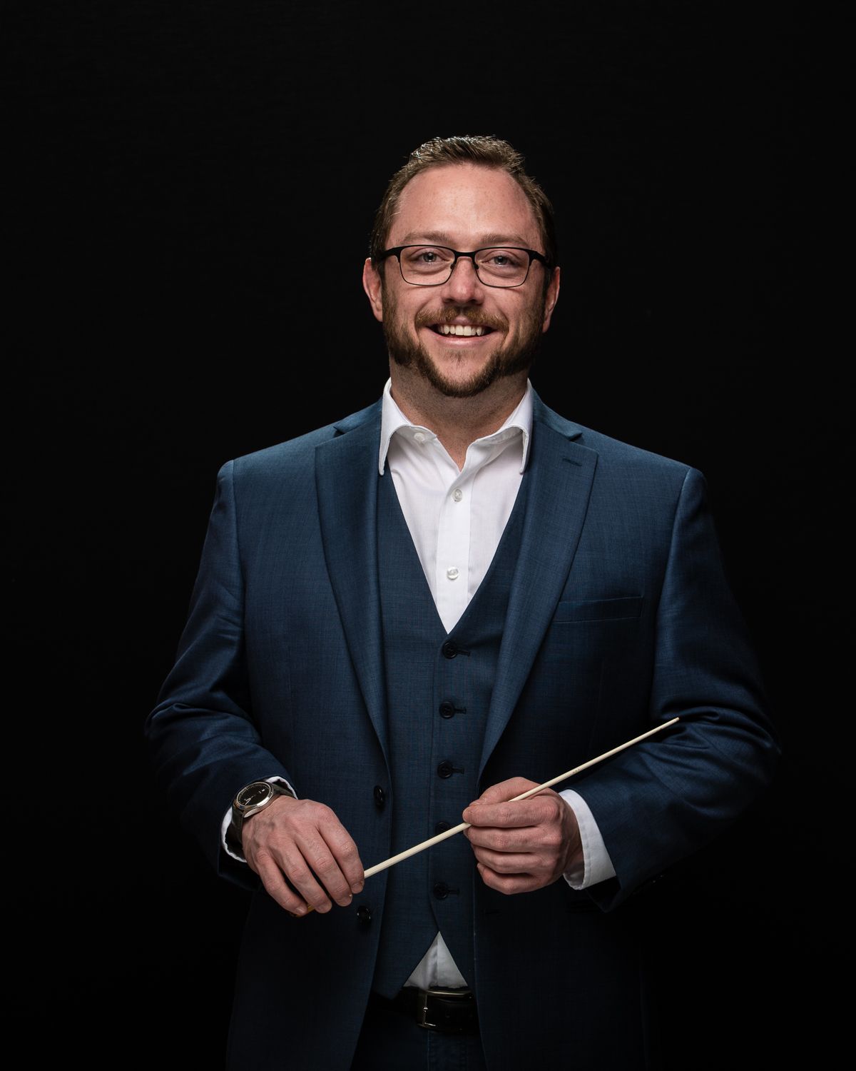 Portrait of a male band conductor.
