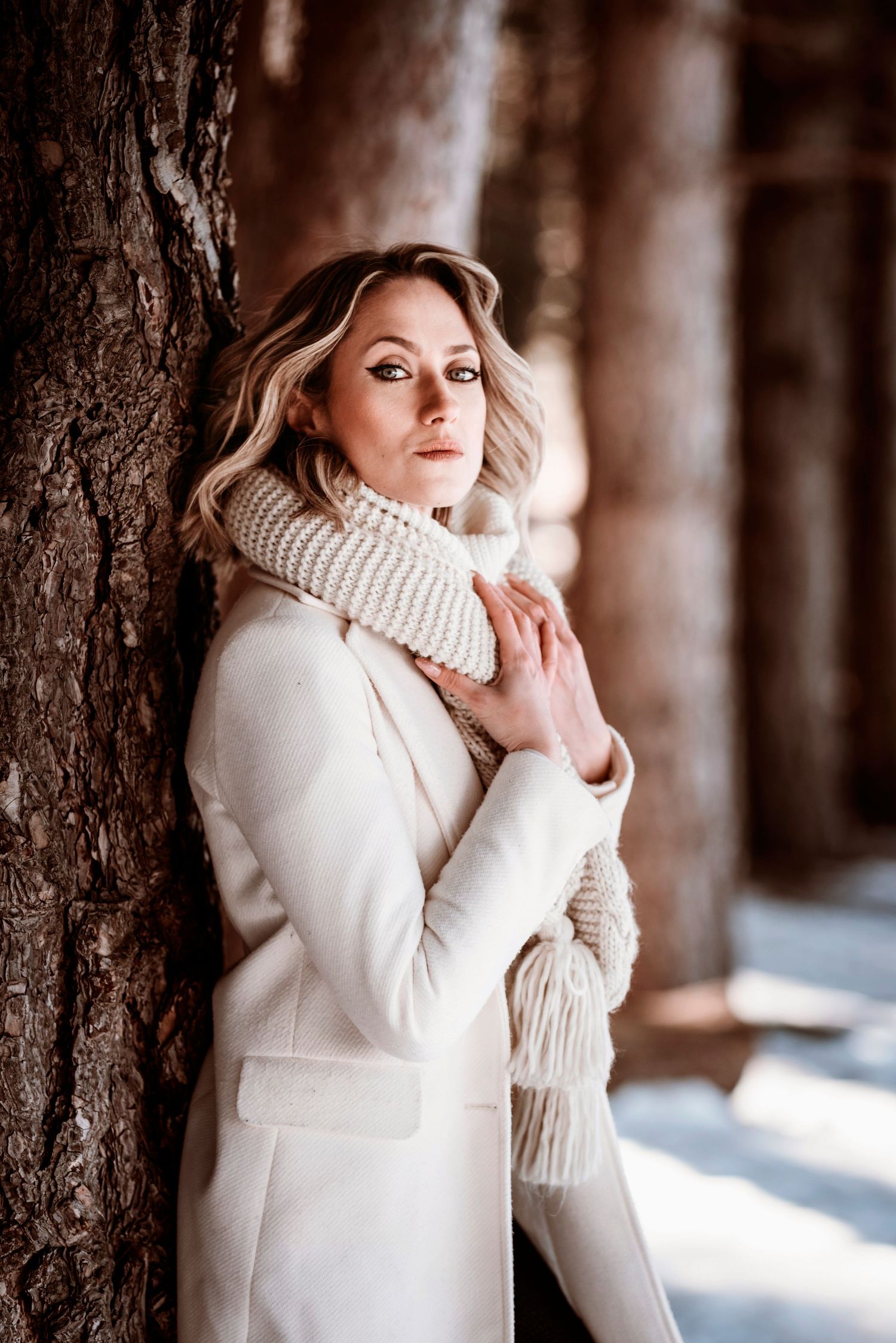 ritratto fotografico femminile in esterna, sulla neve