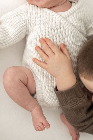 Newborn photography Nottingham baby close up baby brothers hand with newborn detail shot