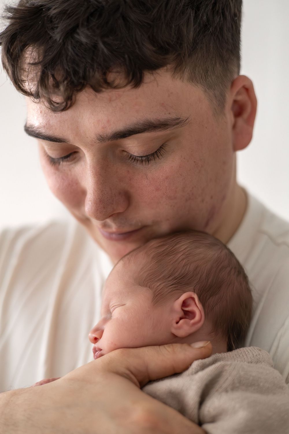 Baby and parent photographer Nottingham studio session relaxed newborn studio photography