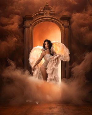 Ethereal fantasy portrait with illuminated archway and angel wings in orange atmospheric setting.