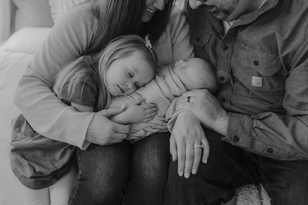 Candid family portrait taken by Elle & Co. Photography in Southeast Michigan