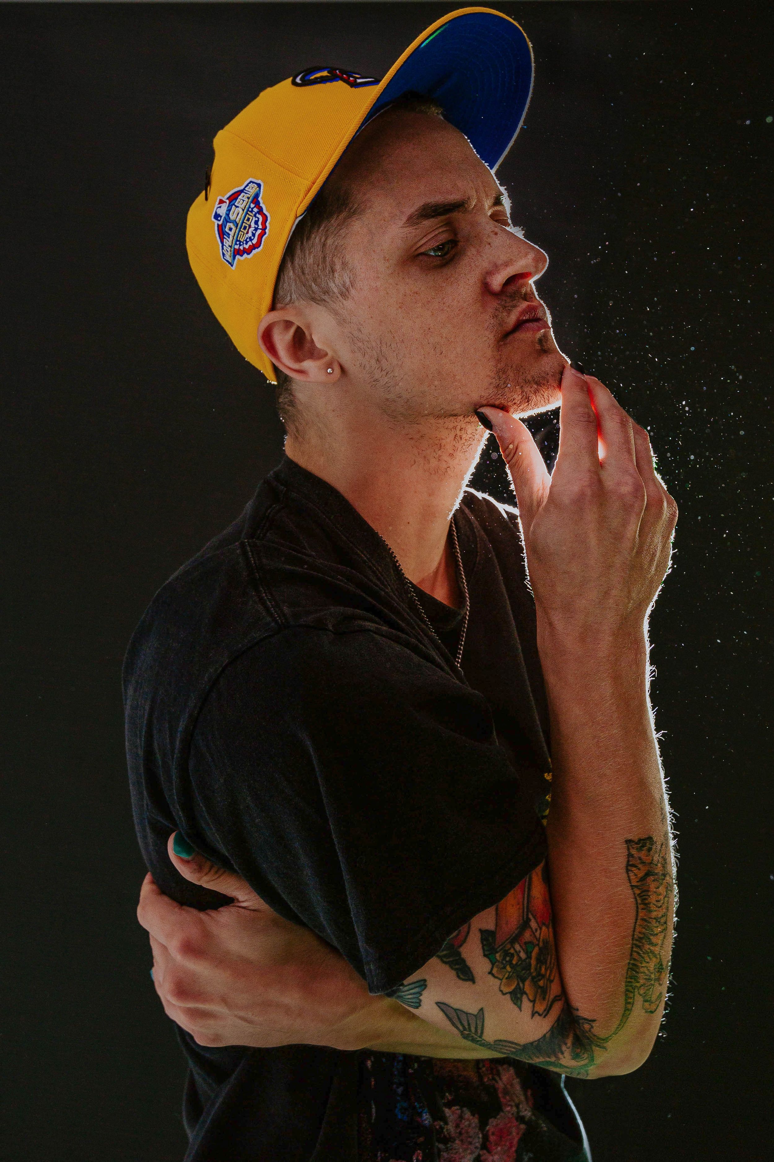 Portrait of a man in a baseball cap.