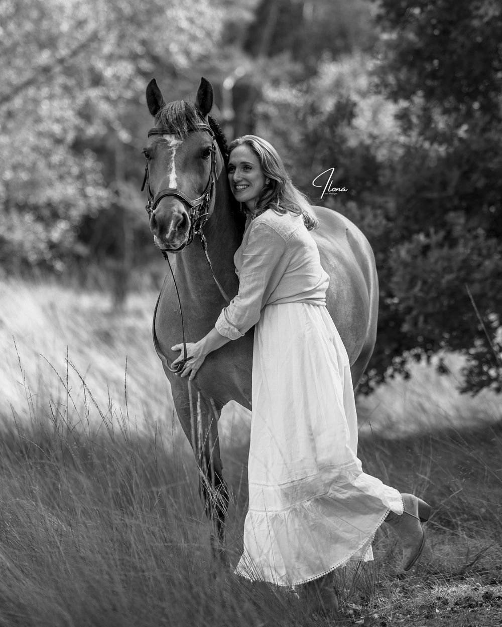 A black and white photo series showing someone in a white dress standing next to a horse in a grassy field.
