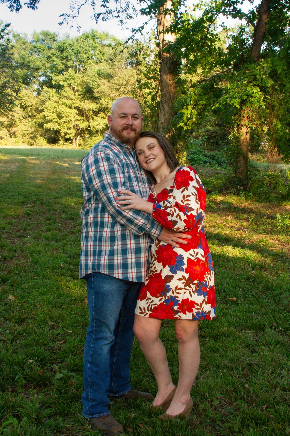 A couple on a summer evening in Manila, Arkansas, by Delta Blossoms Photography