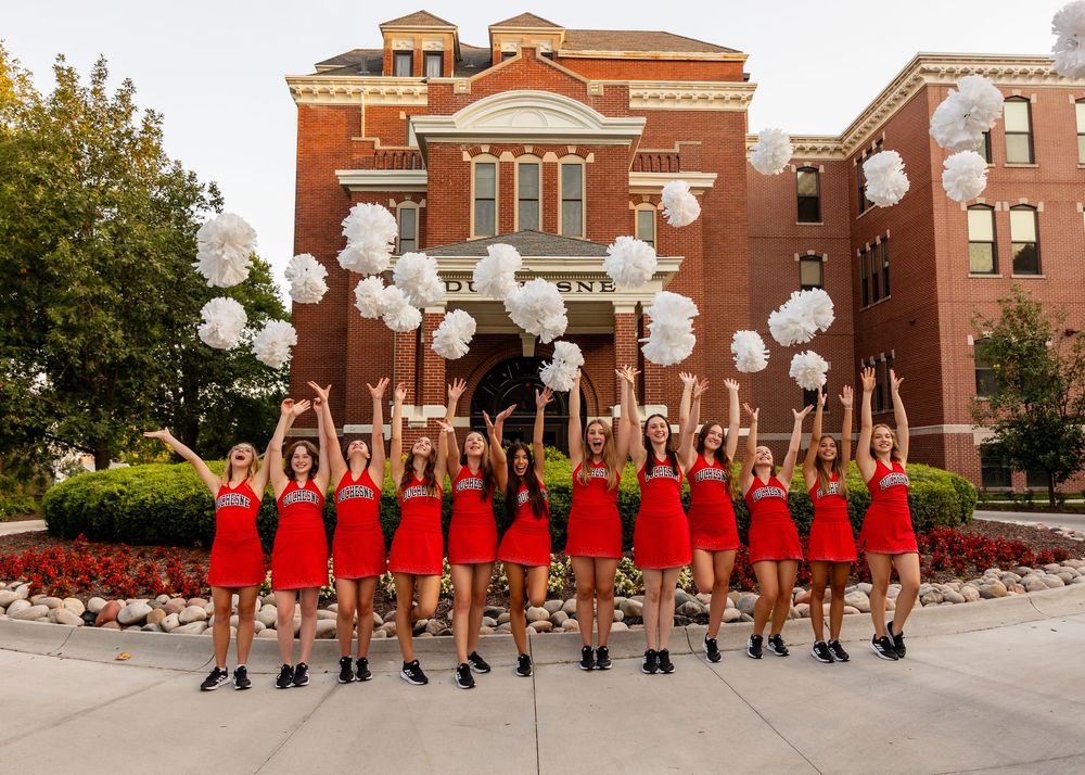 Dance Team in Omaha, NE tosses their poms at Duchesne Academy