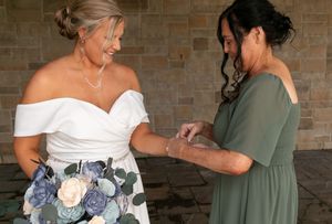 A series of photos showing women helping each other get ready while wearing olive green and white formal dresses.