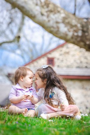 Brother and sister kissing family portrait at Brandywine battlefield