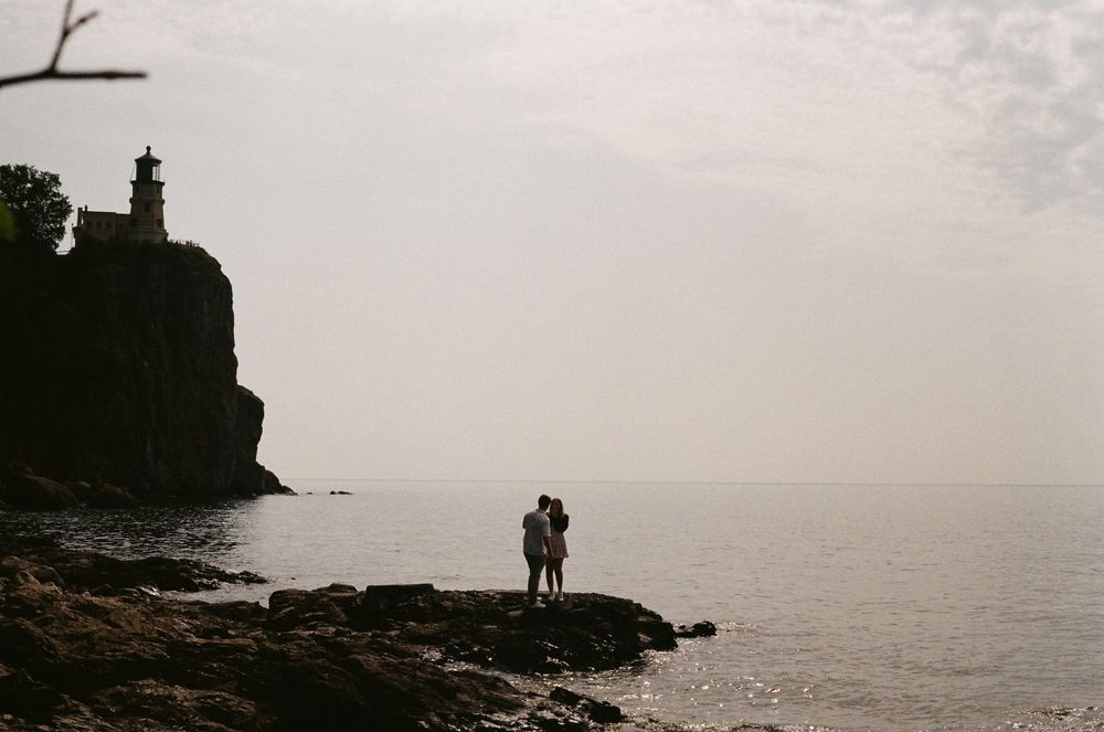 Sneaky proposal shots at Split Rock Lighthouse in Duluth Minnesota