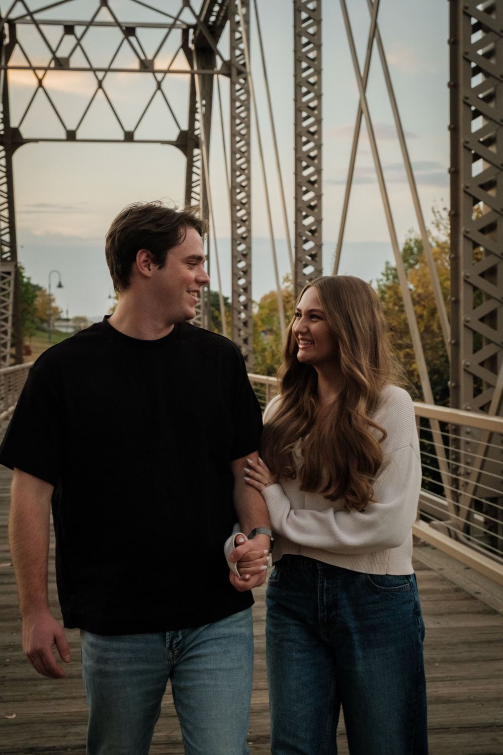 A couple's engagement session on a walking bridge in Minneapolis Minnesota