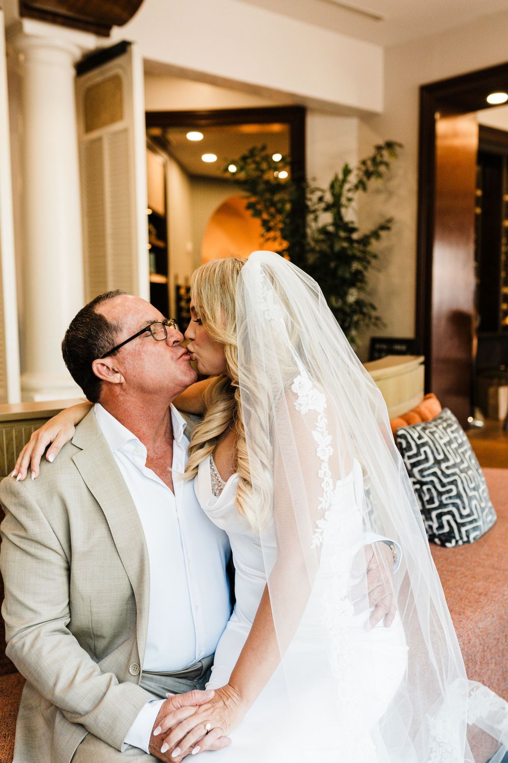Intimate indoor moment captured with soft lighting and elegant decor.