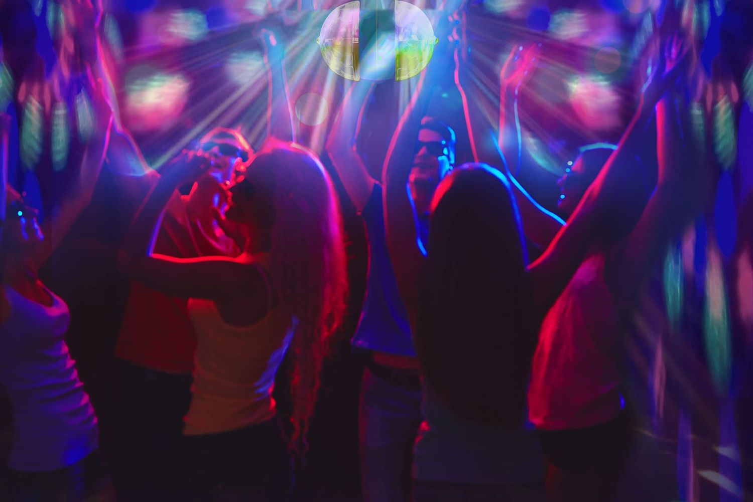 Abstract nightclub scene with colorful purple and blue lighting effects.