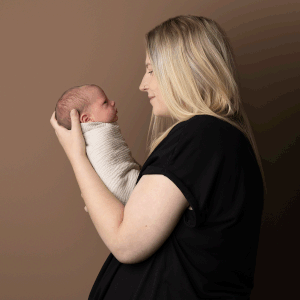 Mother and bond baby captured during a newborn session with Ceris Hicks Photography, based in Ceredigion