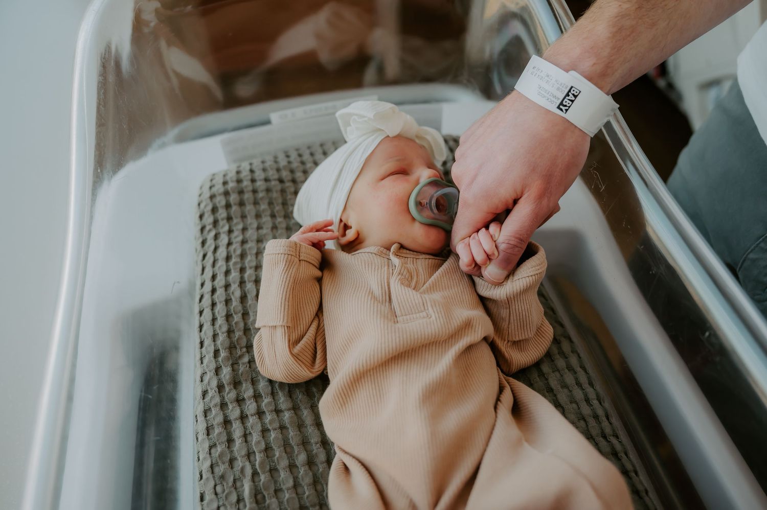 Newborn in a crib