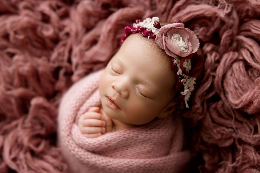 Mauve set for newborn baby girl flokatti wrapped pose