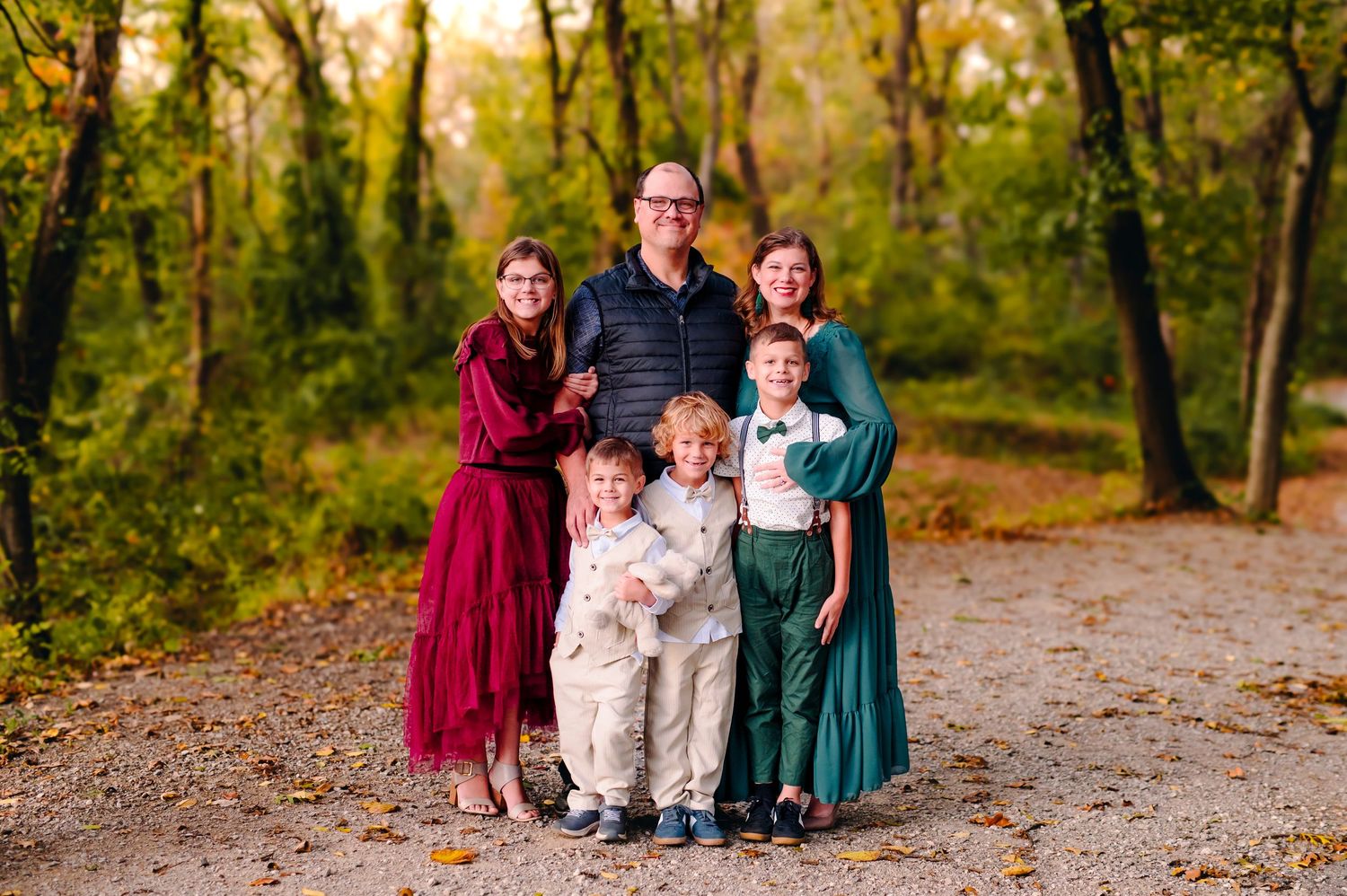 Family in the woods fall photographer Tulsa Broken arrow Jenks Oklahoma Christmas