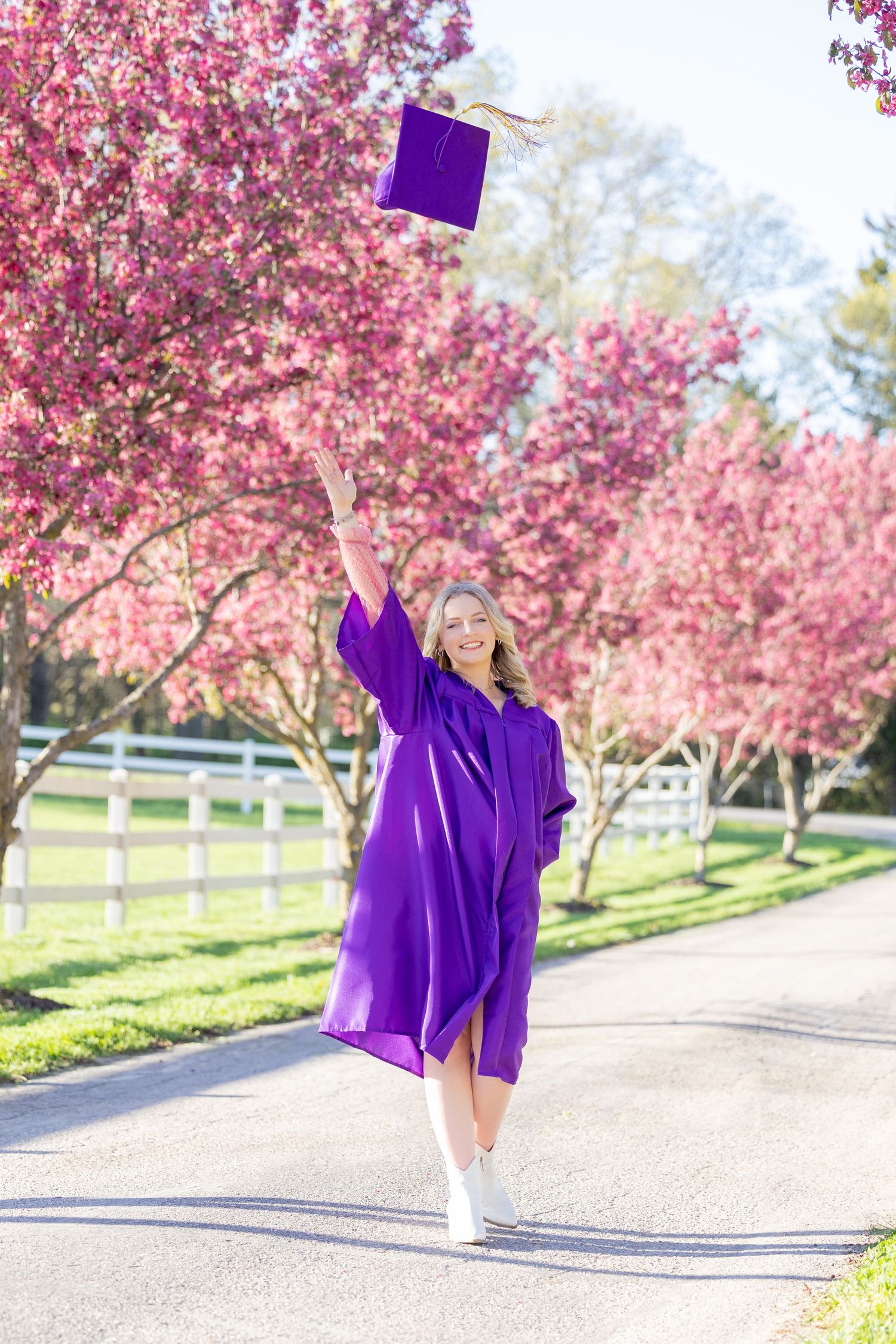 girl throwing graduation cap