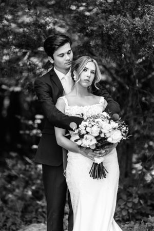 Black and white wedding portraits showing intimate moments and floral details.Middle TN wedding photographer.