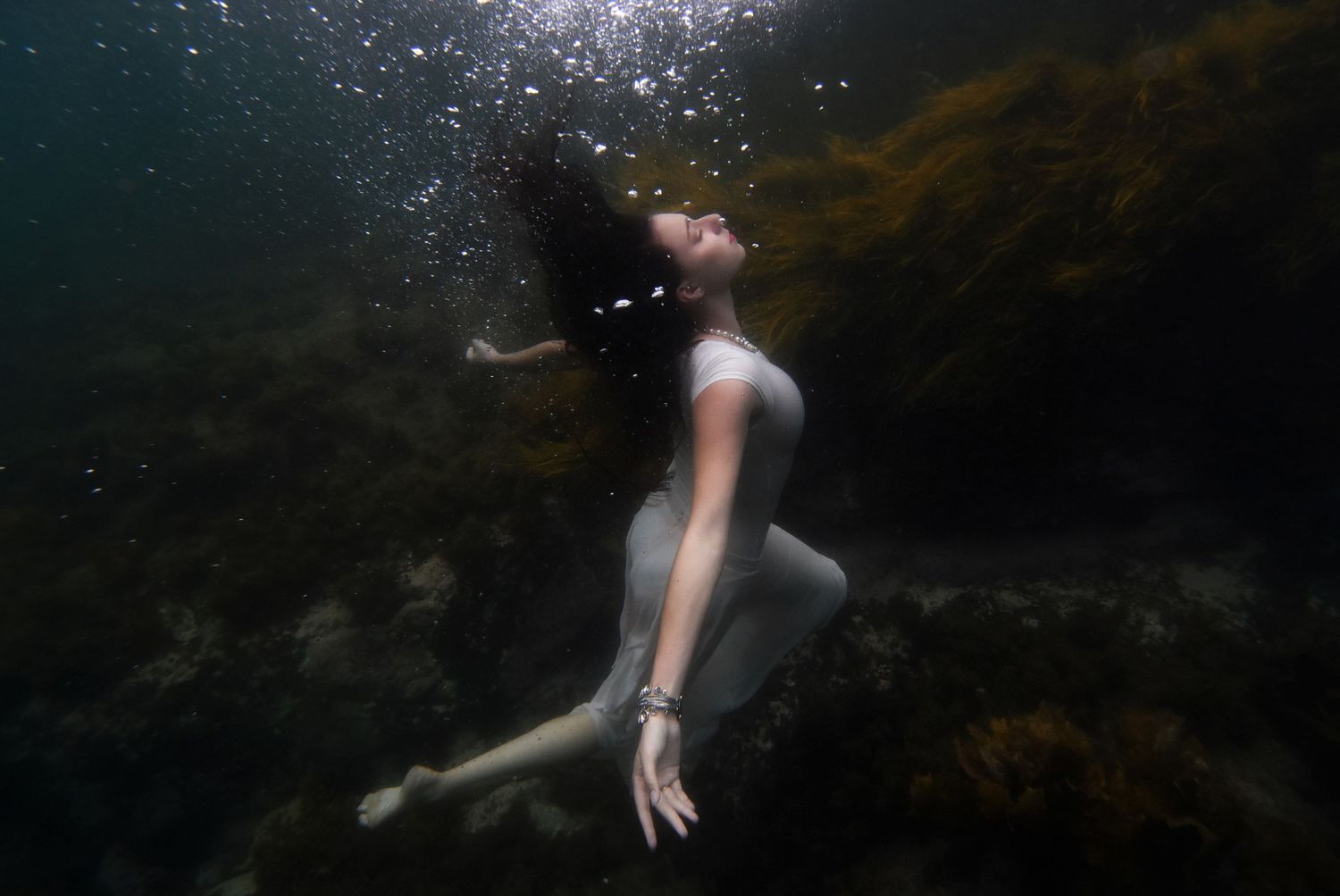 Authentic, emotive portrait underwater photography that captures real moments, true connection, and the unique essence of every individual.