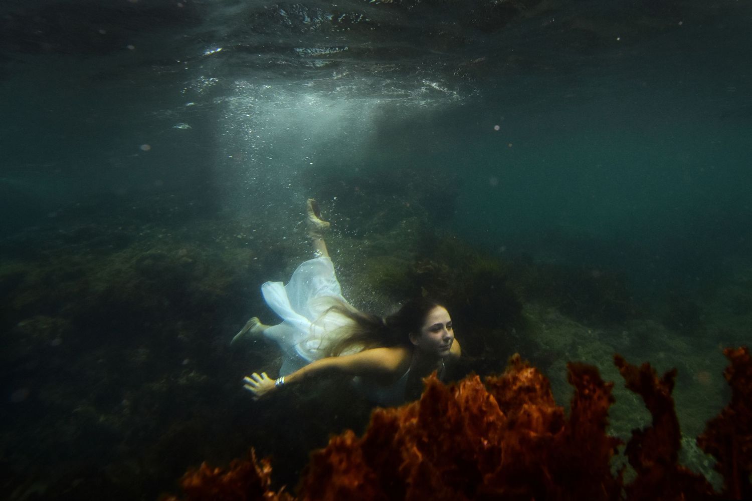Authentic, emotive portrait underwater photography that captures real moments, true connection, and the unique essence of every individual.