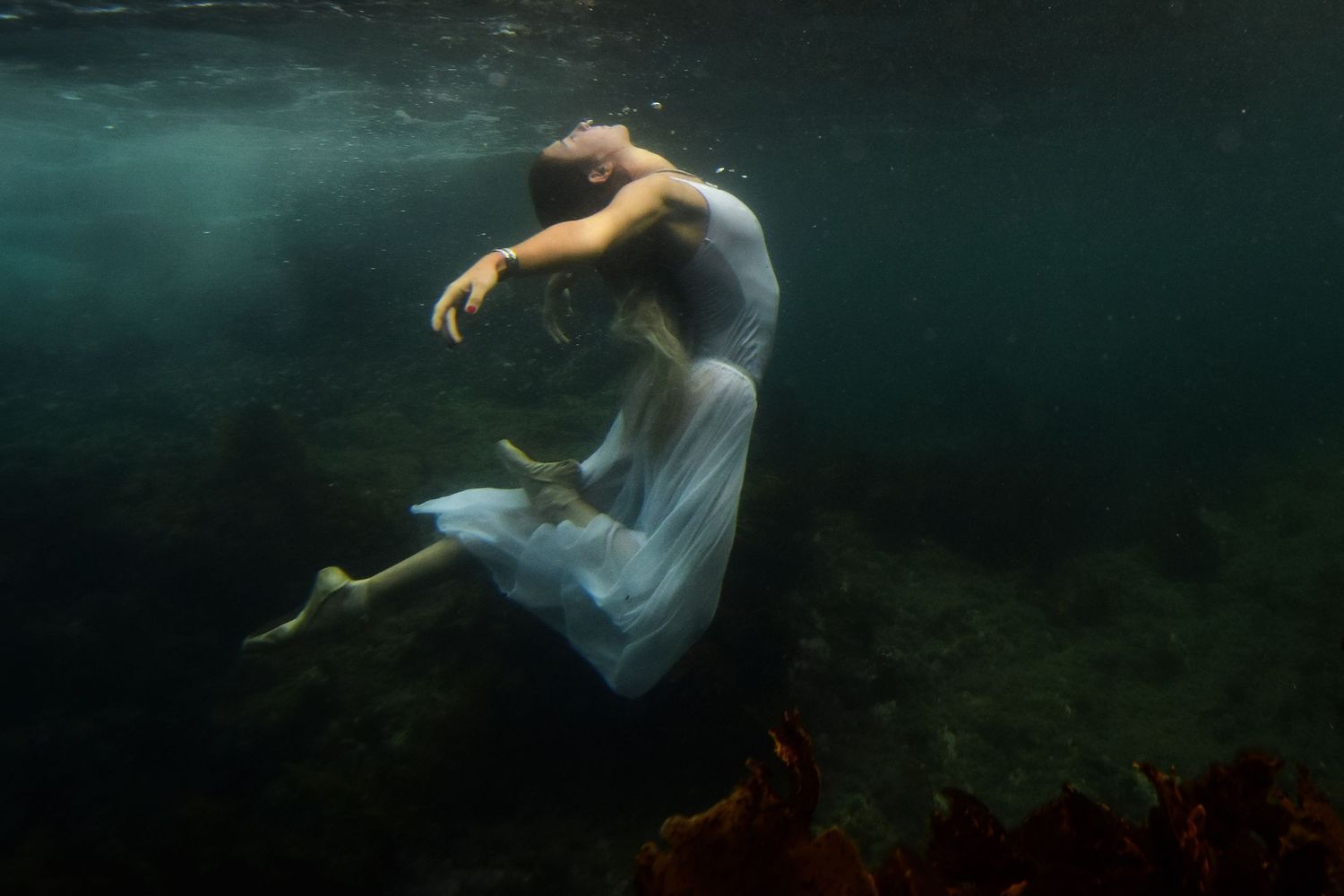 Authentic, emotive portrait underwater photography that captures real moments, true connection, and the unique essence of every individual.