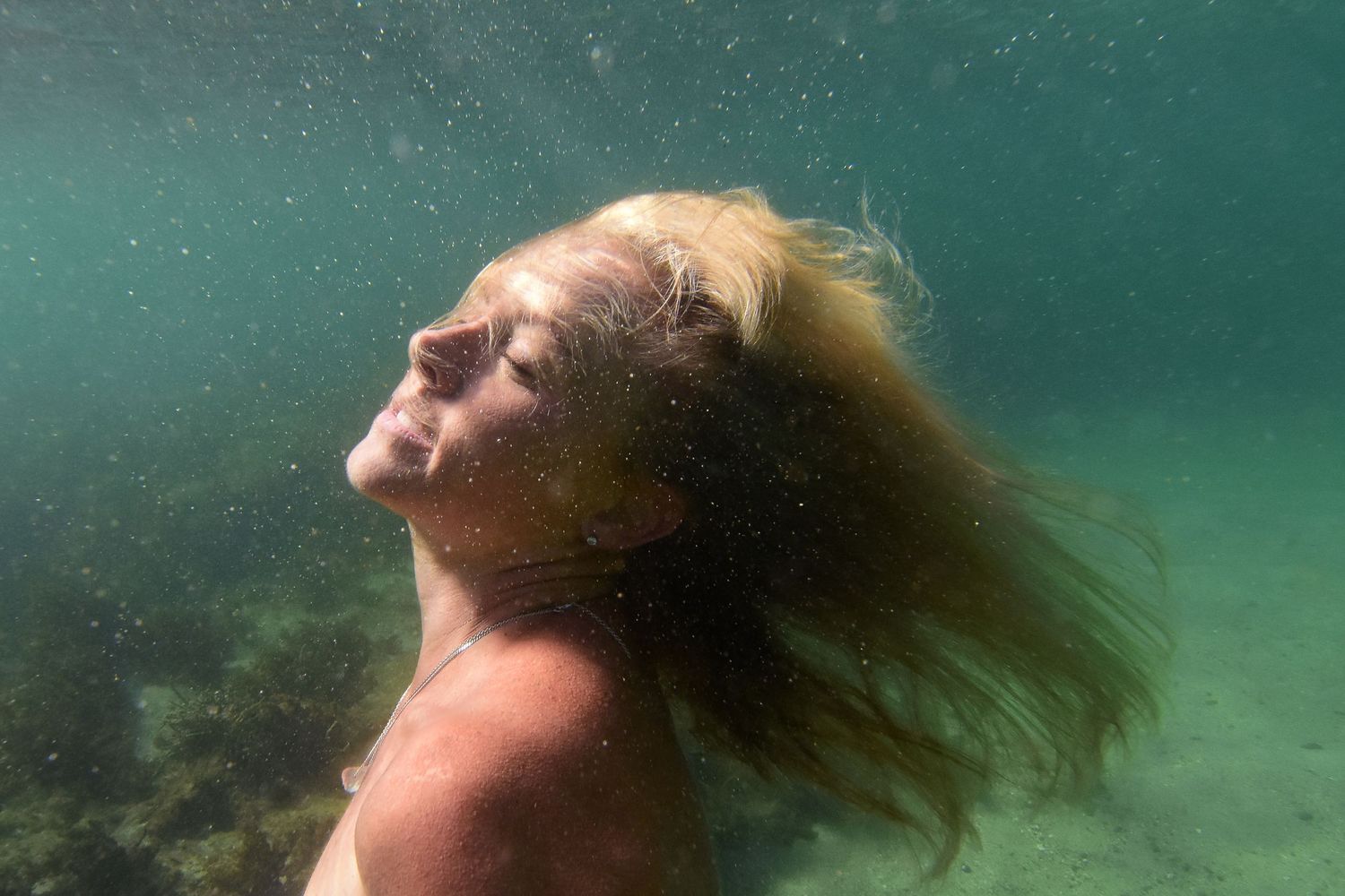 Authentic, emotive portrait underwater photography that captures real moments, true connection, and the unique essence of every individual.