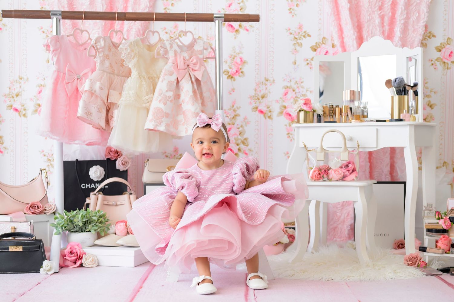 Pink and white floral curtains create a romantic atmosphere in a bright, airy bedroom with feminine decor details.
