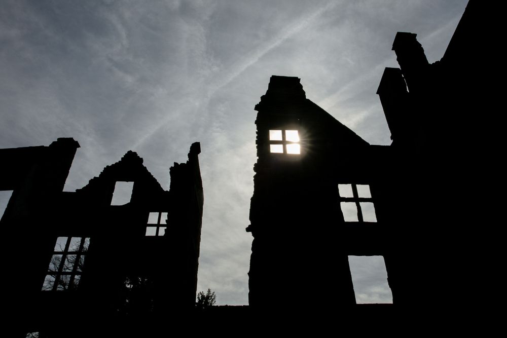 The eerie silhouette of ruined Old Hardwick Hall, Derbyshire, Historic Houses, National Trust. Sunlight creating the effect of moonlight.