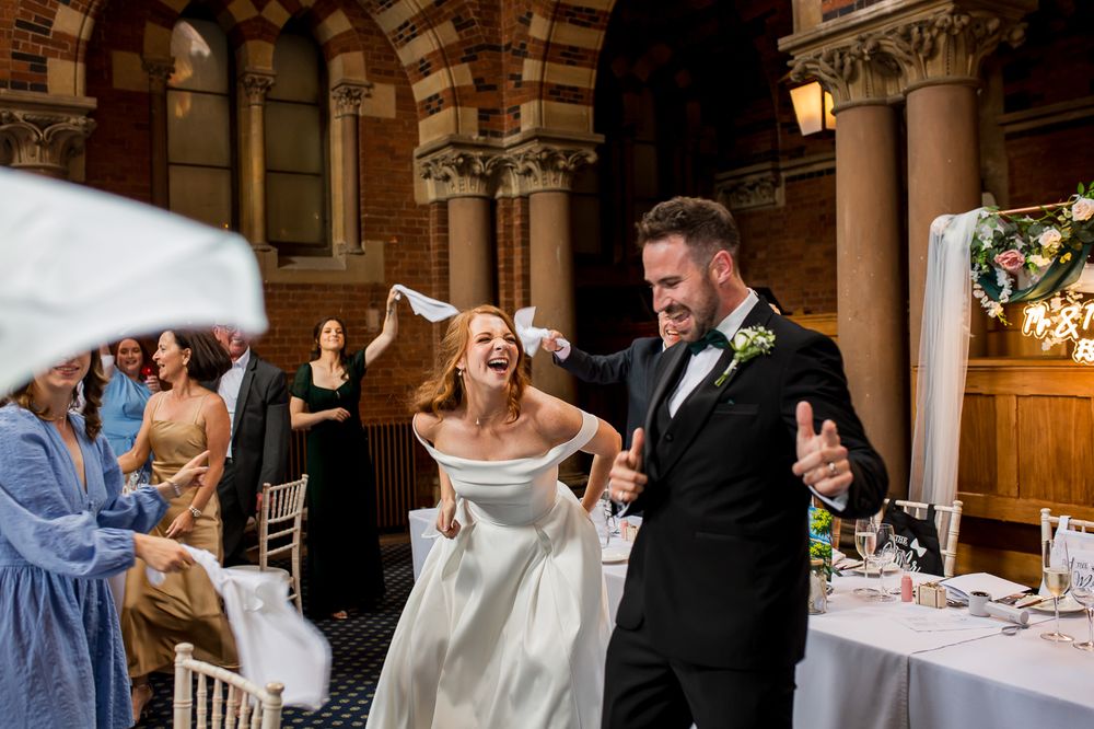 Wedding reception celebration sequence showing dancing and joyful moments in an elegant indoor venue.