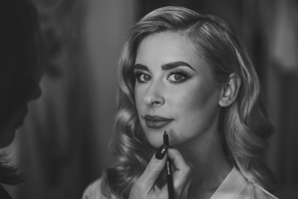 Vintage-inspired black and white beauty shot showcasing classic Hollywood glamour styling. Mill Barns