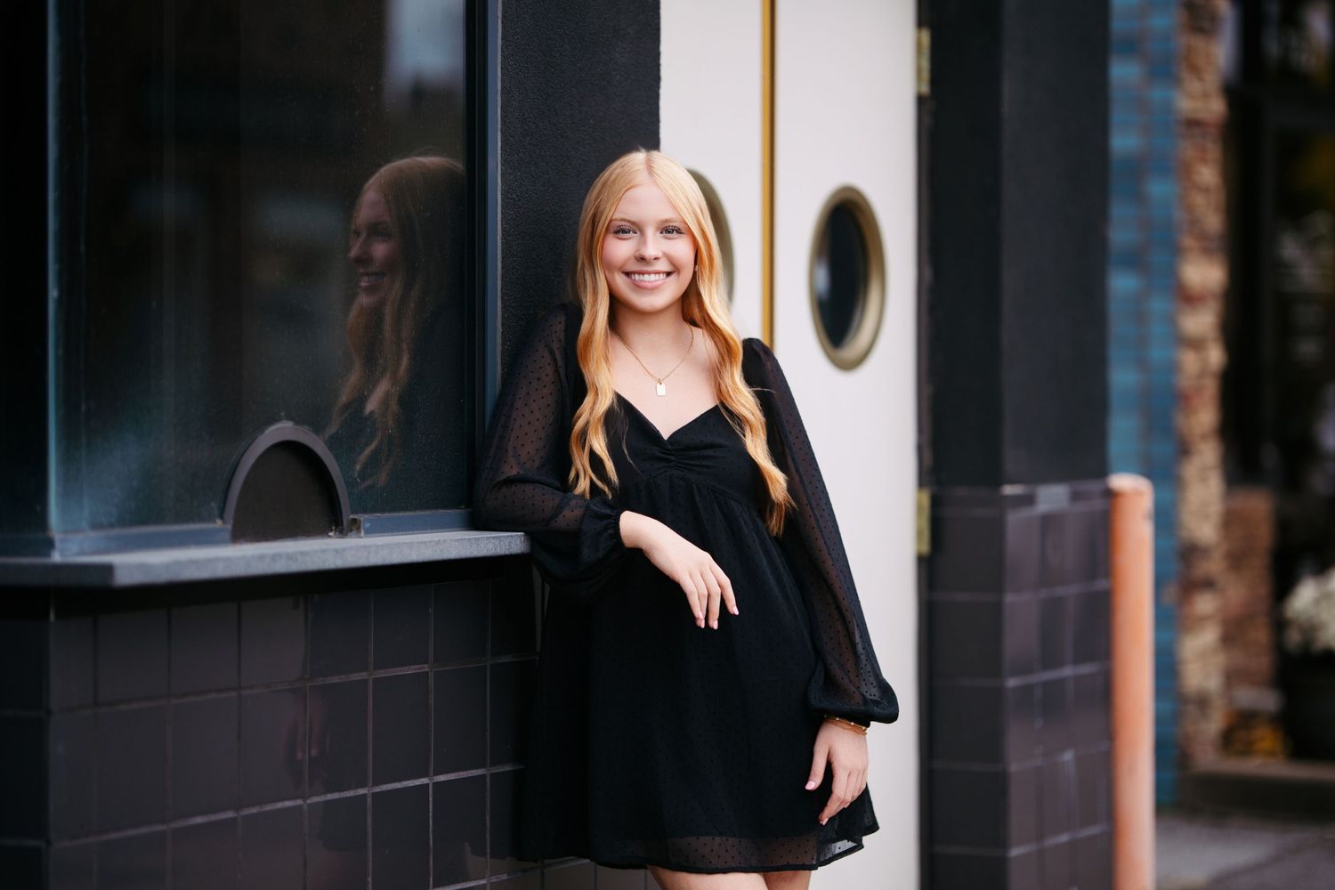 Professional headshot series against modern architectural background.  Middle TN senior photographer.
