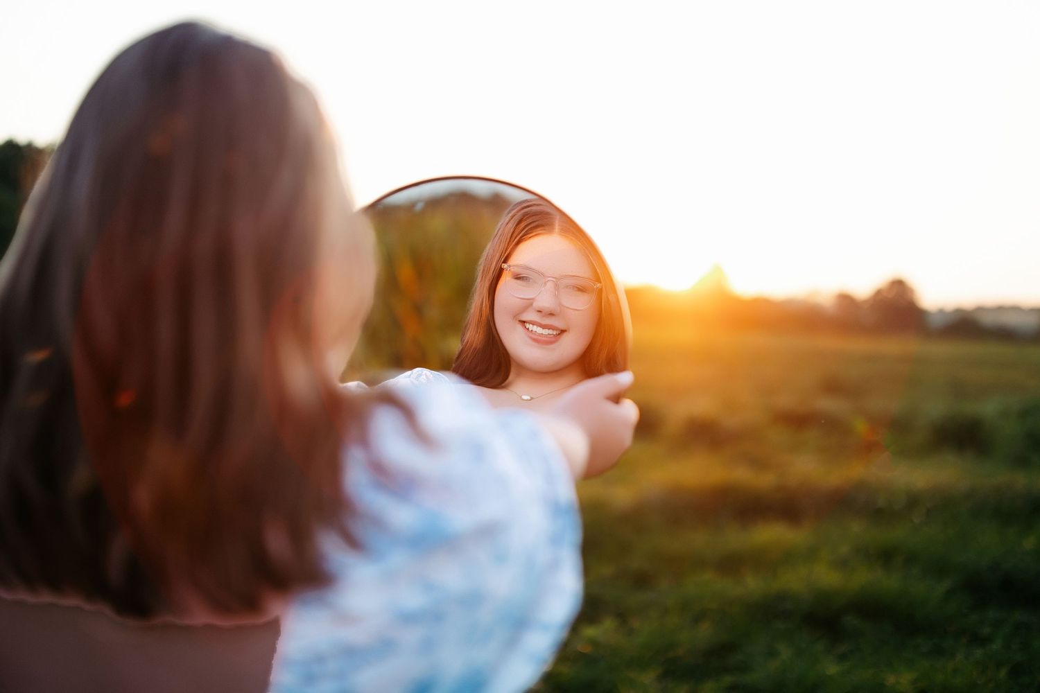 Sunset portrait session in a natural outdoor setting. Middle TN senior photographer.