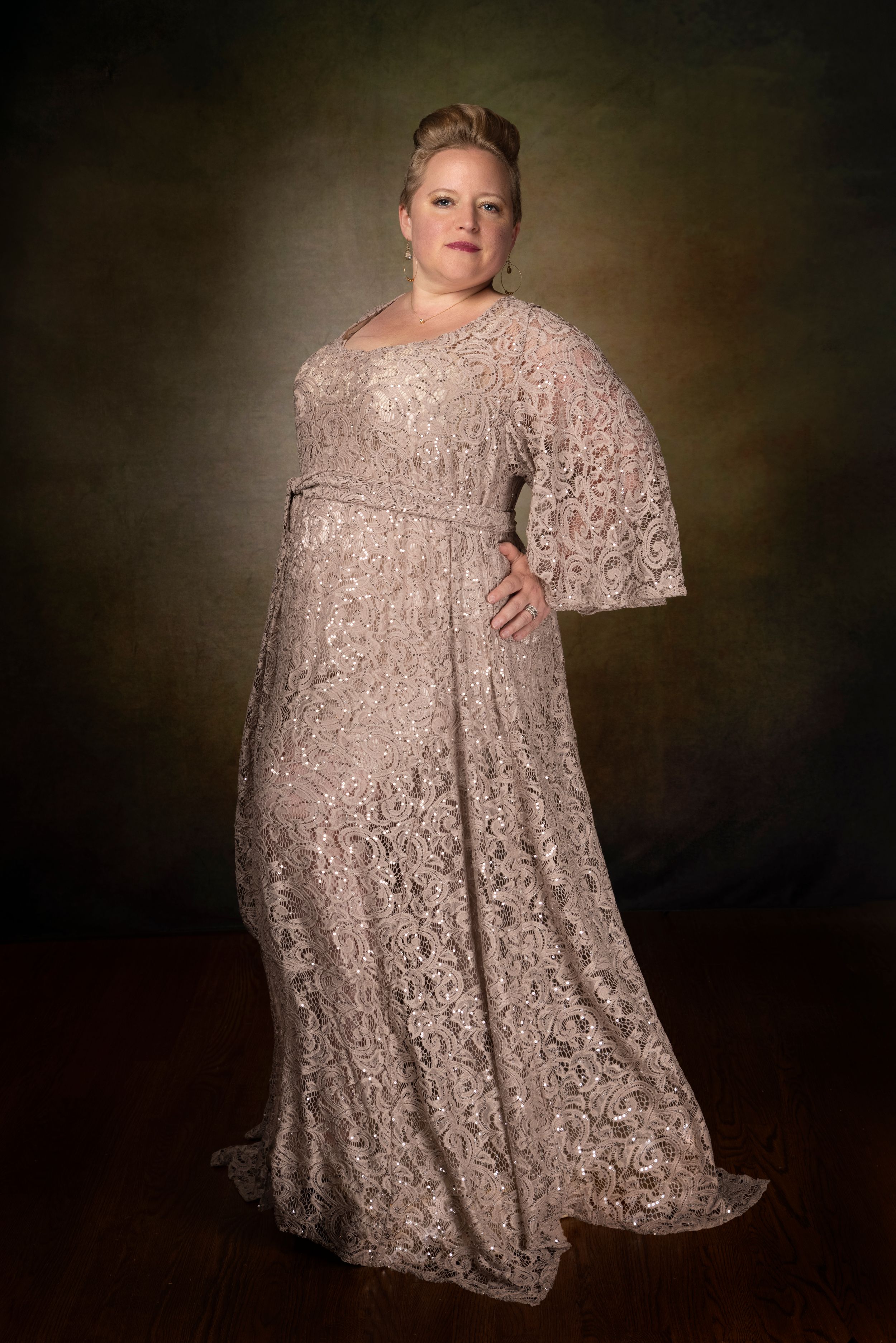 Glamour photo of curvy woman in formal studio photoshoot