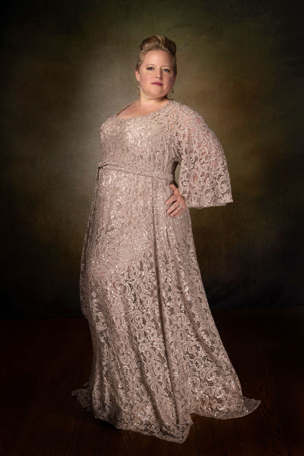 Glamour photo of curvy woman in formal studio photoshoot