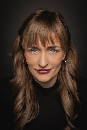 A series of moody studio portraits showing brown hair, dark lipstick, and expressive eyes against a black background.