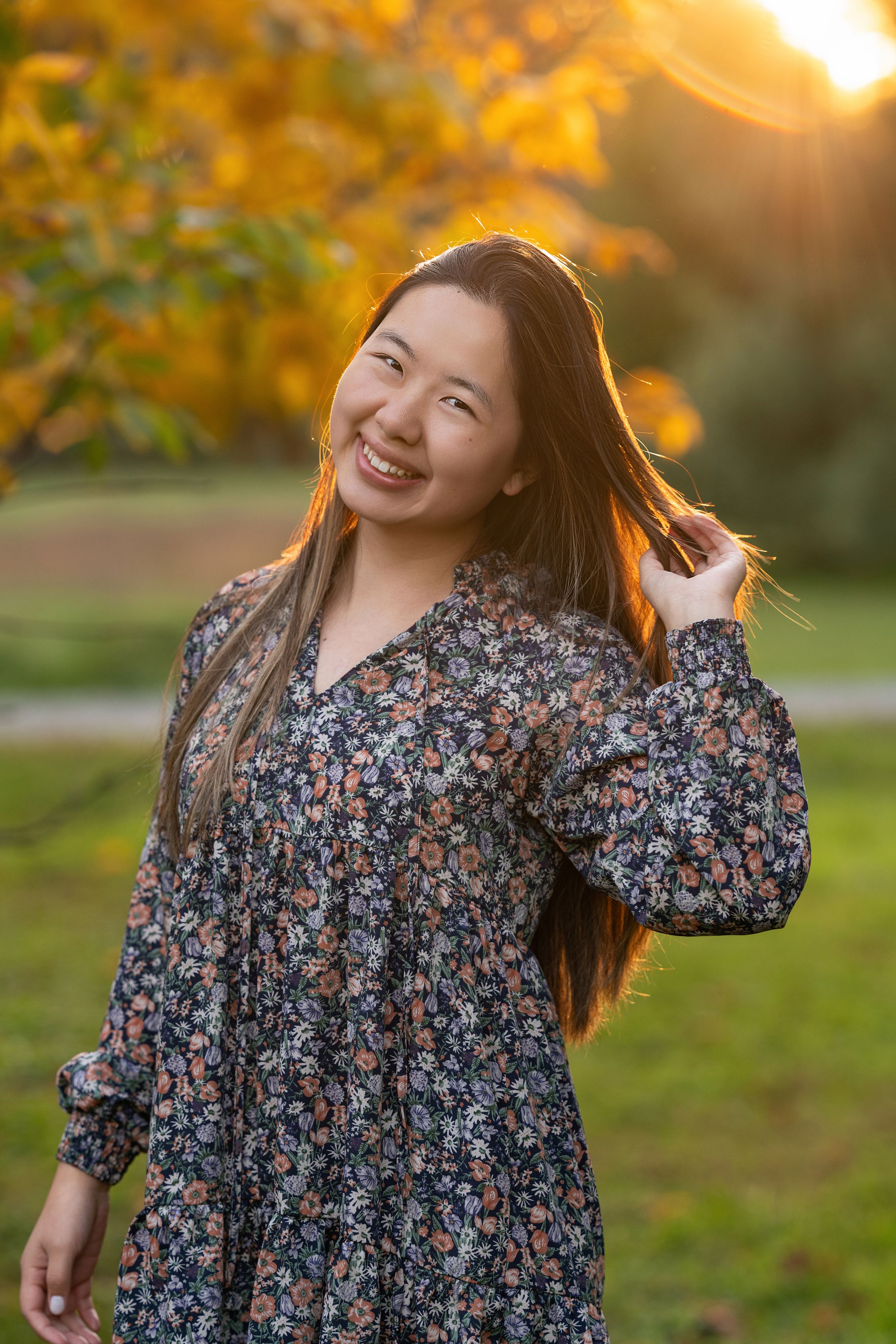 Teen girl poses in outdoor golden light at Blandy VA State Arboretum