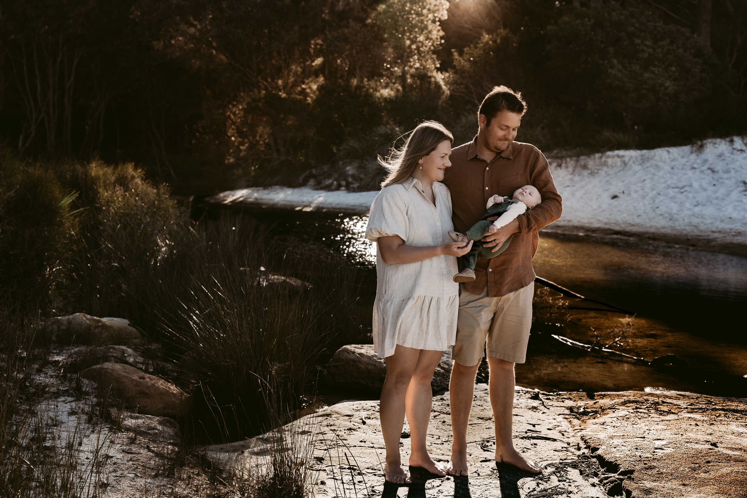 family-newborn-sunset-beach-photo-session-jervis-bay-mum-dad-newborn-embrace