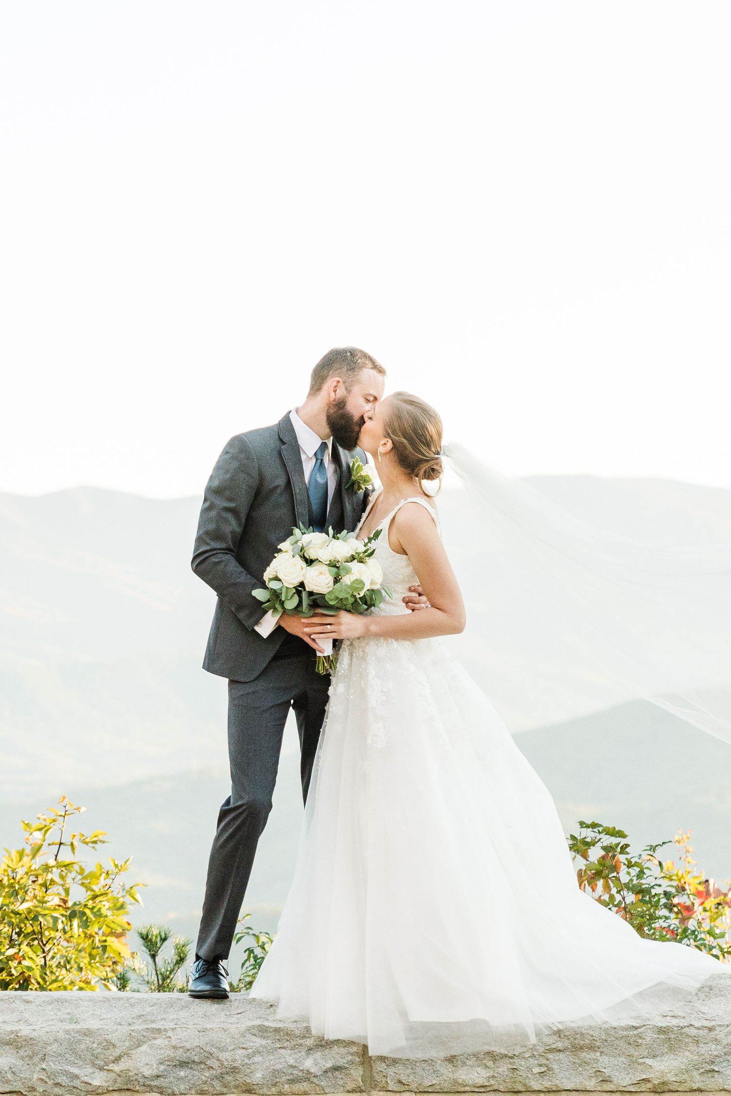 Couple kissing in water by Knoxville Wedding Photographer, Juhi Photography, Tennessee Wedding Photographer