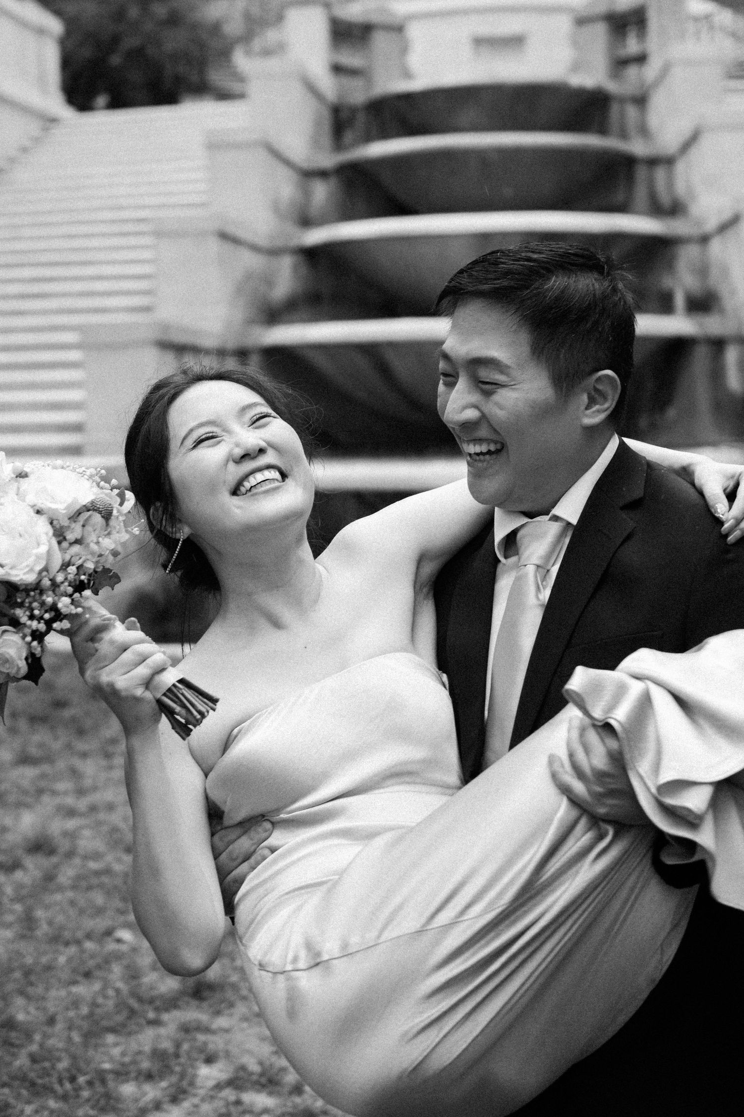Black and white candid dancing shots showing joyful movement and laughter.