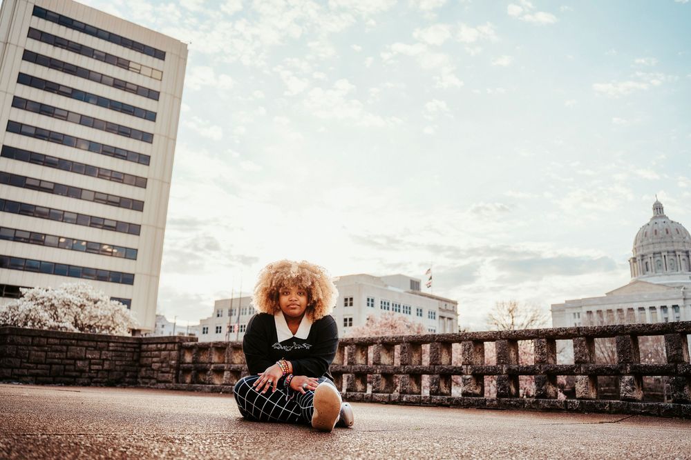 Urban wedding photography featuring architectural elements and skyline views.