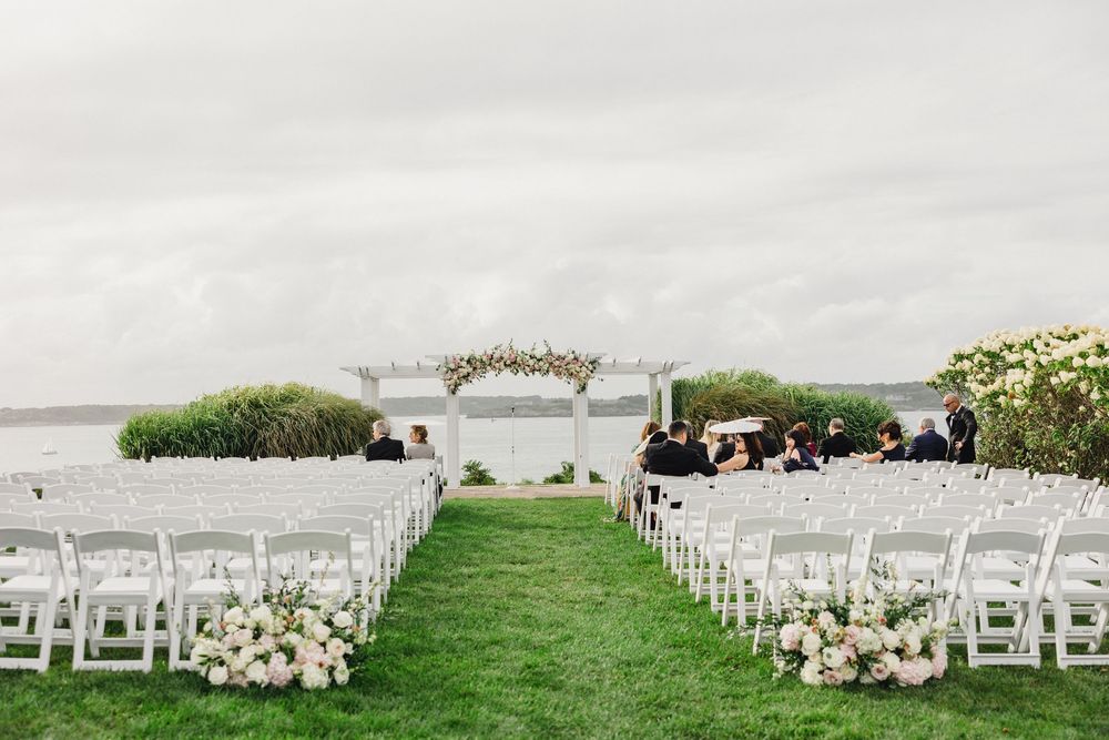 Waterfront wedding ceremony at OceanCliff Hotel in Newport, Rhode Island. Wedding photographer in Newport RI