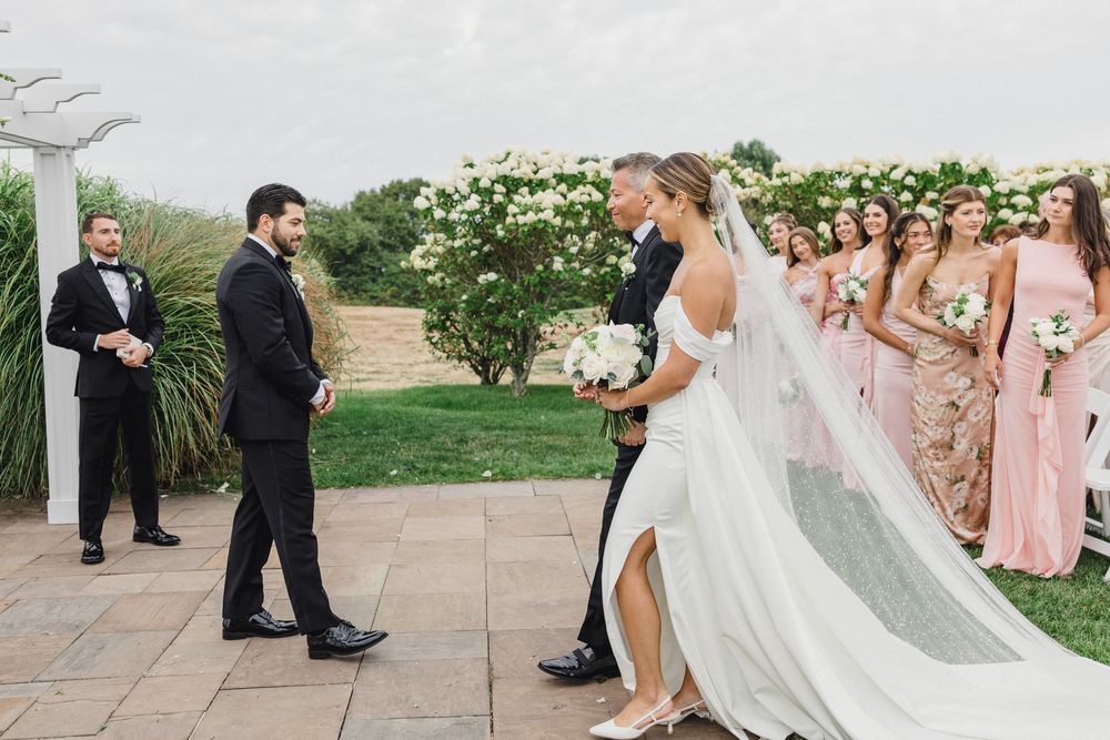 Waterfront wedding ceremony at OceanCliff Hotel in Newport, Rhode Island. Wedding photographer in Newport RI