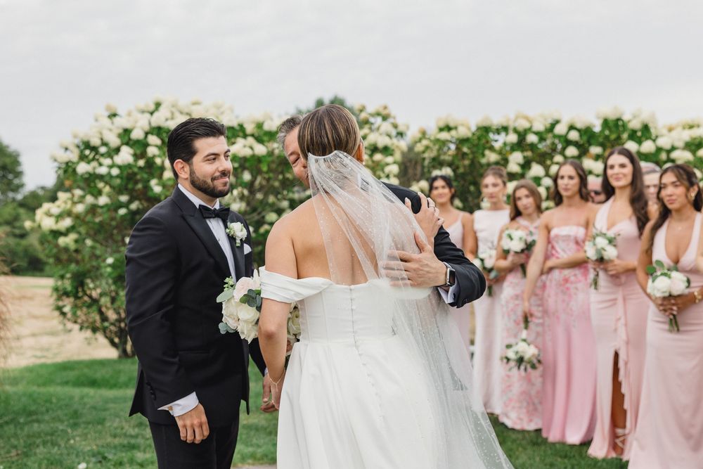 Waterfront wedding ceremony at OceanCliff Hotel in Newport, Rhode Island. Wedding photographer in Newport RI