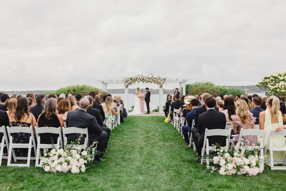 Waterfront wedding ceremony at OceanCliff Hotel in Newport, Rhode Island. Wedding photographer in Newport RI