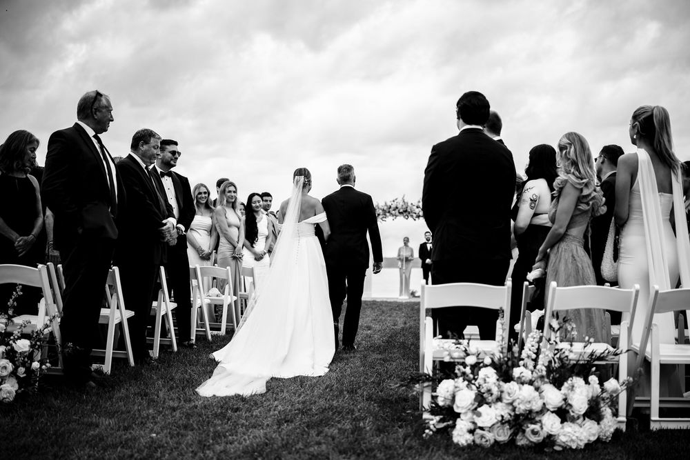 Waterfront wedding ceremony at OceanCliff Hotel in Newport, Rhode Island. Wedding photographer in Newport RI