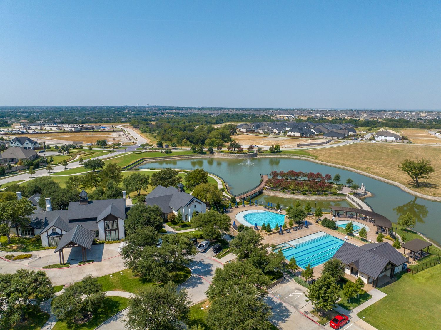 Resort amenities including swimming pool and clubhouse facilities viewed from above.