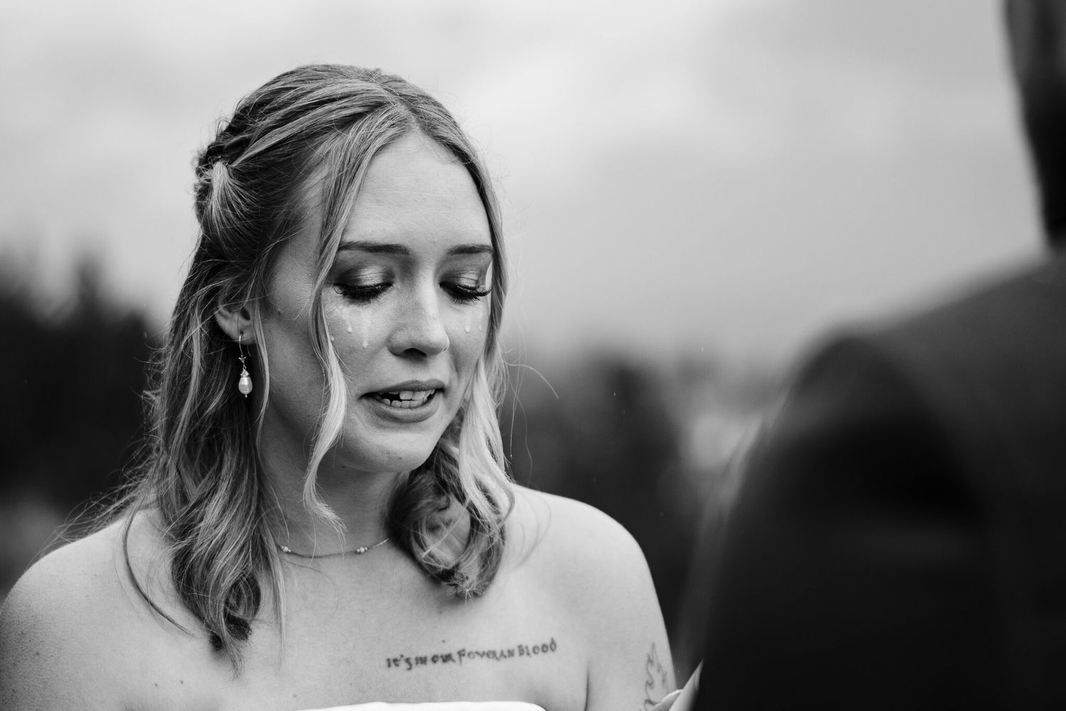 Bride with happy tears during private vows at her Canmore wedding